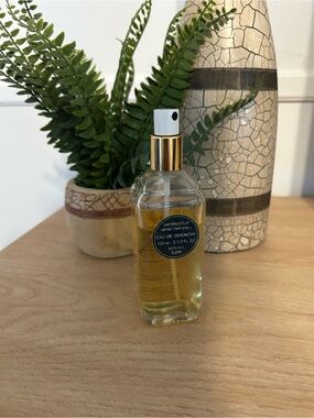 Givenchy Clear Glass Perfume Bottle with Gold Accents